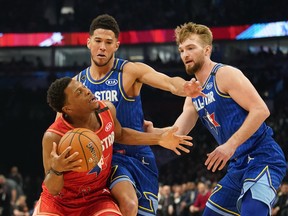 The Raptors' Kyle Lowry is guarded during the all-star game at the United Centre in Chicago. Lowry was mum on where he would be spending his post-all-star-game vacation. (Kyle Terada/USA TODAY Sports)