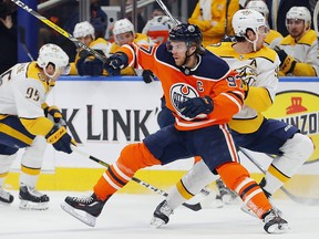 Edmonton Oilers forward Connor McDavid (97) tries to stay on-side against the Nashville Predators at Rogers Place. (Perry Nelson-USA TODAY Sports)