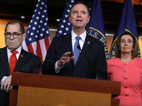 House Intelligence Committee Chairman Adam Schiff, centre, speaks after U.S. Speaker of the House Nancy Pelosi, right, announces that he and House Judiciary Committee Chairman Jerrold Nadler, left, and five additional members will be managers of the Senate impeachment trial of President Donald Trump at the U.S. Capitol in Washington, D.C., on Jan. 15, 2020.