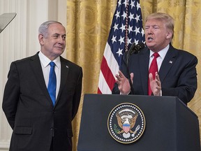 U.S. President Donald Trump and Israeli Prime Minister Benjamin Netanyahu participate in a joint statement in the East Room of the White House on Jan. 28, 2020 in Washington, D.C.