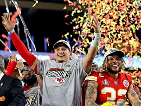 Kansas City Chiefs quarterback Patrick Mahomes (15) and strong safety Tyrann Mathieu (32) celebrate after beating the San Francisco 49ers in Super Bowl LIV at Hard Rock Stadium. Mandatory Credit: Matthew Emmons-USA TODAY Sports/File Photo