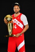 Norman Powell of the Toronto Raptors poses for a portrait with the Larry O'Brien Trophy after winning Game Six of the 2019 NBA Finals against the Golden State Warriors on June 13, 2019.  (Photo by Jesse D. Garrabrant/NBAE via Getty Images)