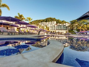 Relax poolside at the Planet Hollywood Beach Resort.