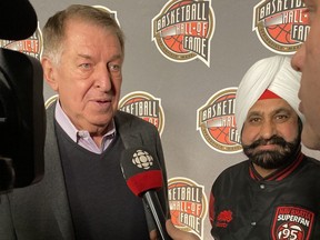 Raptors Superfan Nav Bhatia, right, with Jerry Colangelo in Chicago during NBA All-Star Game weekend. (Push Marketing Group)