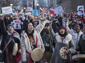 People gather outside of Queen's Park during a Family Day march in support of the Wet'suwet'en hereditary chiefs in Toronto on Monday, February 17, 2020. THE CANADIAN PRESS/ Tijana Martin