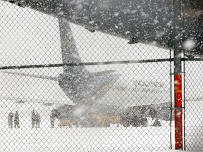 A plane arrives at CFB Trenton, carrying Canadian passengers that were evacuated from Wuhan, China, on Friday Feb. 7, 2020.