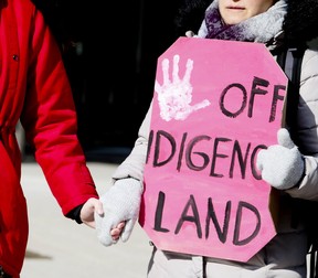 A rally in support of Wet’suwet’en hereditary chiefs saw demonstrators march from Queen’s Park to City Hall on Saturday, Feb. 22, 2020. (Veronica Henri/Toronto Sun/Postmedia Network)