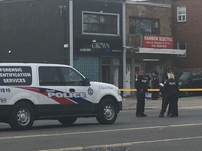 Police officers responded after a woman was stabbed in a massage parlour. (Kevin Connor, Toronto Sun)