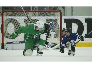 Toronto Maple Leafs Mitch Marner teaches Kyle Clifford's son Brody the fist pump celebration after Brody beat goalie Jack Campbell during a little one-on-one play at the end of practice  in Toronto on Wednesday February 19, 2020. Jack Boland/Toronto Sun/Postmedia Network