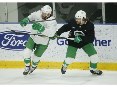 Toronto Maple Leafs Kyle Clifford LW (73) and Timothy Liljegren D (20) joust with each other during practice in Toronto on Wednesday February 19, 2020. Jack Boland/Toronto Sun/Postmedia Network