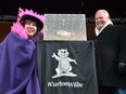 Mayor of the Town of South Bruce Peninsula Janice Jackson, left, and Ontario Premier Doug Ford pose next to groundhog Wiarton Willie in a ceremony in Wiarton, Ont. on Feb. 2, 2019.