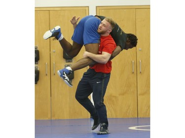 Clayton Pye, a wrestler at Brock University, gets in some training with one of his teammates Iggy Pitt. Pye has overcome adversity after almost being fatally stabbed a few years ago, is well on his way to competing for Canada at the Olympics.  in Toronto, Ont. on Tuesday February 18, 2020. Jack Boland/Toronto Sun/Postmedia Network