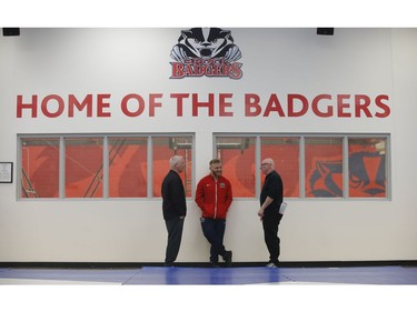 Clayton Pye, a wrestler at Brock University, - speaks with Steve Buffery (R) and his Brock wrestling coach Marty Calder (L). Pye has overcome adversity after almost being fatally stabbed a few years ago, is well on his way to competing for Canada at the Olympics.  in Toronto, Ont. on Tuesday February 18, 2020. Jack Boland/Toronto Sun/Postmedia Network