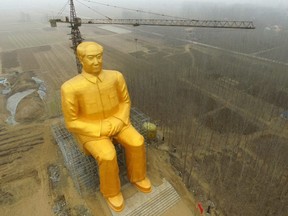 This photo taken on Jan. 4, 2016 shows a huge statue of Chairman Mao Zedong under construction in Tongxu county in Kaifeng, central China's Henan province. (AFP via Getty Images)