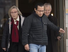 Wet'suwet'en hereditary leader Chief Woos, also known as Frank Alec, centre, Minister of Crown-Indigenous Relation, Carolyn Bennett, left, and B.C. Indigenous Relations Minister Scott Fraser arrive to address the media in Smithers, B.C.. on Sunday.