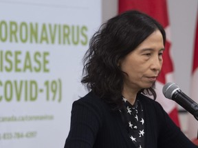 Chief Public Health Officer Theresa Tam listens to a question on a teleconference about COVID-19 during a news conference on Sunday March 15, 2020 in Ottawa.