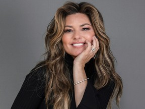 Shania Twain poses for a portrait at her Manhattan hotel, Friday, June 14, 2019, in New York. Twain co-stars in the new movie I Still Believe. (Christopher Smith/Invision/AP)