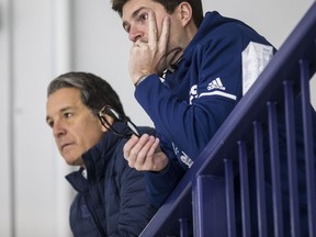 Just like you, Kyle Dubas Leafs GM (R)  and Brendan Shanahan are at home waiting to see when hockey will be back on.  Craig Robertson/Toronto Sun/Postmedia Network