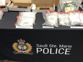 Drugs and guns seized by police in Sault Ste. Marie, Ont. from a group of alleged drug dealers