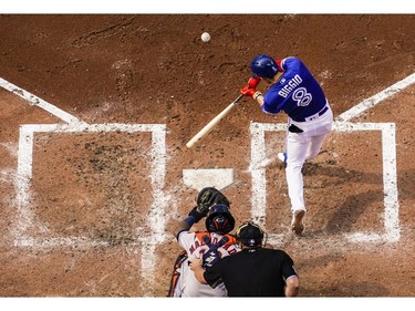 Cavan Biggio #8 of the Toronto Blue Jays hits a home run against the Houston Astros in the fourth inning during their MLB game at the Rogers Centre on August 31, 2019 in Toronto, Canada.