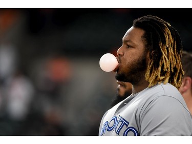 Vladimir Guerrero Jr. #27 of the Toronto Blue Jays blows a bubble prior to the game against the Baltimore Orioles at Oriole Park at Camden Yards on September 18, 2019 in Baltimore, Maryland.