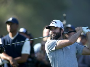 Adam Hadwin of Canada tees off at the 11th hole during round three of the Genesis Invitational at the Riviera Country Club on February 15, 2020 in Pacific Palisades, California.