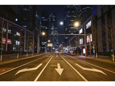 A nearly empty street is seen during the usually busy evening rush hours in the central business district on March 9, 2020 in Beijing, China.