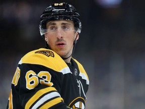 Brad Marchand of the Boston Bruins looks on during the first period of the game against the Calgary Flames  at TD Garden on February 25, 2020 in Boston, Massachusetts.