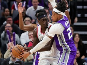 Toronto Raptors forward Pascal Siakam is double-teamed by a pair of Sacramento Kings defenders. (USA TODAY SPORTS)