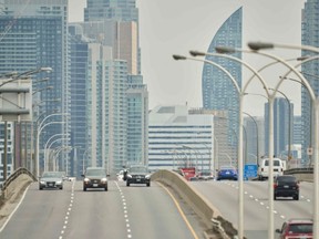 A few vehicles drive along the usually-congested Gardner Expressway on March 24, 2020. (AFP via Getty Images)