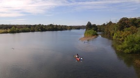 Paddlers work their way down the Colorado River in Austin. DAVE POLLARD/TORONTO SUN