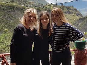 Susan Parsons (left) was travelling with her daughters, Gabrielle, 16, (far right) and Adelaide, 14, in Ecuador when COVID-19 upgraded to a pandemic. The family arrived in Ecuador on March 11 and was informed that flights were being cancelled. She reached out to the Canadian government to help bring her home, but says she was told they "were not a priority." SUPPLIED