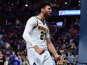 Denver Nuggets guard Jamal Murray  reacts following a basket against the Milwaukee Bucks earlier this season. (USA TODAY SPORTS)