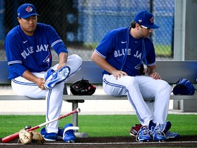 Jays’ Hyun-Jin Ryu (left) turned in a strong simulated start yesterday in Dunedin, striking out the last four batters he faced. Meanwhile, down in Port Charlotte, rotation hopeful Anthony Kay (right) was hit hard by the Rays.  Douglas DeFelice/USA TODAY Sports