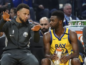 Warriors guard Stephen Curry (left) could be making his return to the lineup against the Raptors on Thursday. Since being traded to Golden State last month, Andrew Wiggins has been putting up big numbers.  Kyle Terada/USA TODAY Sports