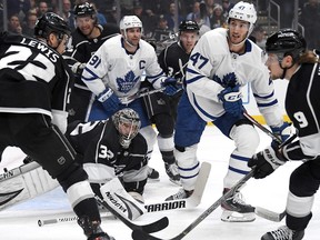 Maple Leafs Pierre Engvall right) storms the Kings net during Thursdays game at the Staples Center. He was later taken off John Tavares line. Jayne Kamin-Oncea/USA TODAY Sports