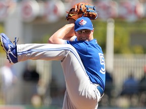 Blue Jays starter Trent Thornton goes into his windup yesterday.  Thornton got knocked around for the first time this spring but overall remains the early favourite for the fifth starter’s role.                         Sam Navarro-USA TODAY