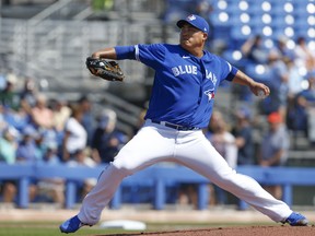 Blue Jays ace Hyun-Jin Ryu delivers a pitch yesterday during the first inning against the Tampa Bay Rays at TD Ballpark in Dunedin, Fla. The Jays, thanks to a solid 41/3 innings from Ryu, won 8-3 with a split squad as Danny Jansen paced the offence with a grand slam.  Reinhold Matay/USA TODAY Sports