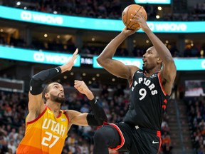The Raptors’ Serge Ibaka (right) shoots over Jazz centre 
Rudy Gobert on March 9. The Raptors won the game, it was their final tilt before the league shut down
USA TODAY SPORTS