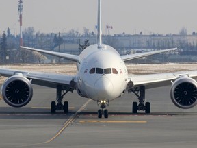 A WestJet Boeing 787 Dreamliner arrives from London in Calgary on Tuesday, March 17, 2020.