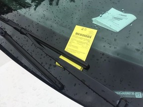 A ticket left on a car by a parking enforcement officer in Toronto's west end on Tuesday, March 17, 2020 (Michelle Cliffe)