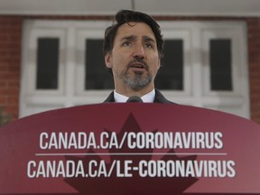 Prime Minister Justin Trudeau speaks to the media about the COVID-19 pandemic during a news conference outside Rideau cottage in Ottawa, Friday, March 20, 2020. THE CANADIAN PRESS/Adrian Wyld