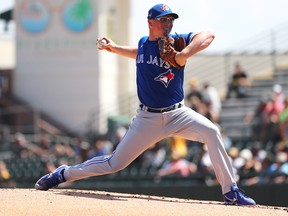 Toronto Blue Jays starting pitcher Trent Thornton throws a pitch during the first inning against the Pittsburgh Pirates  at LECOM Park.