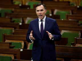 Minister of Finance Bill Morneau speaks in the House of Commons as legislators convene to give the government power to inject billions of dollars in emergency cash to help individuals and businesses through the economic crunch caused by the novel coronavirus outbreak, on Parliament Hill in Ottawa, Wednesday, March 25, 2020.