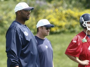 Coach Stephen McAdoo left) is shown here during his first stint as offensive-line coach with the Argos. (Jack Boland/Toronto Sun)
