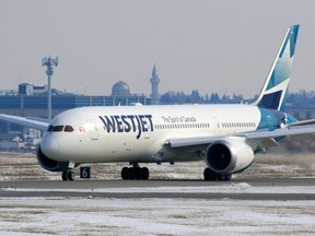 A WestJet Boeing 787 Dreamliner arrives in Calgary from London on Tuesday, March 17, 2020.