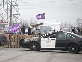Native protestors block two ends of Hwy 6 in Caledonia in support of the Wet-suwet'en pipeline dispute and the OPP removal of the blockade in Belleville on Monday  on Tuesday February 25, 2020.