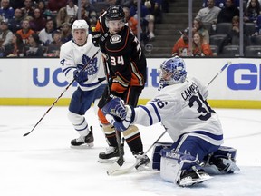 Maple Leafs goaltender Jack Campbell stops the Ducks' Sam Steel on Friday night in, Anaheim, Calif. Campbell continues to provide solid back-up goaltending for Toronto. (Marcio Jose Sanchez/The Associated Press)