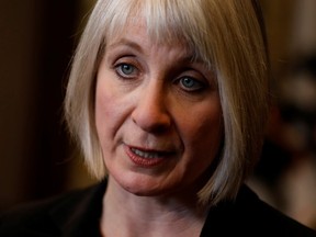 Canada's Minister of Health Patty Hajdu speaks to media on Parliament Hill in Ottawa.