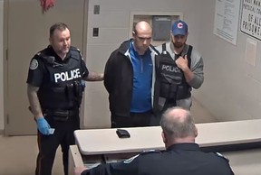 Alek Minassian is booked at 32 Division after the April 23, 2018 van attack in Toronto